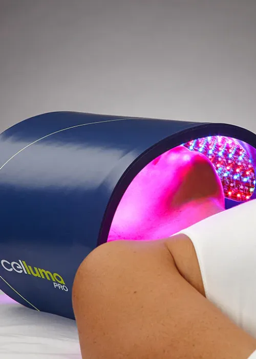 woman getting Celluma Blue LED Light Therapy Acne Treatment